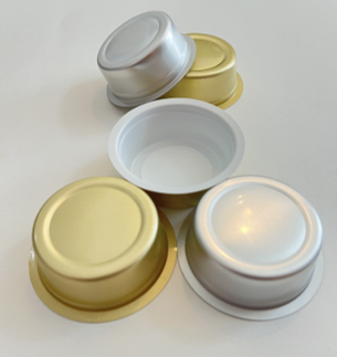 アルミック缶の有償サンプルを示したイメージ写真。形状やサイズ、仕上がりの質感を確認できます。