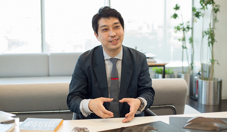 インタビューに答えるDNPモビリティ事業部の太田浩永リーダー
